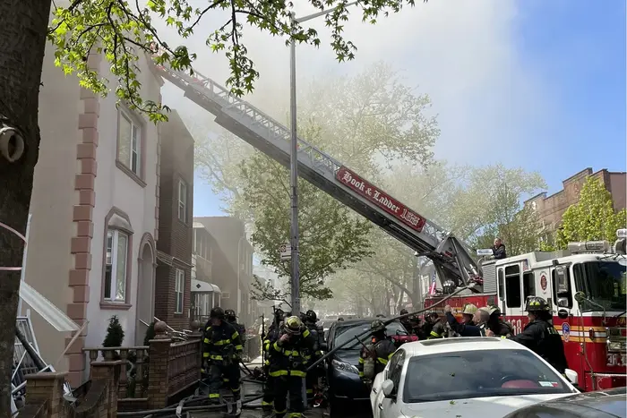 Firefighters battle the four-alarm blaze in Bensonhurst, Brooklyn on Tuesday, April 23 2024.